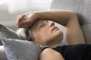 woman lie on sofa