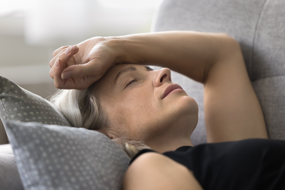 woman lie on sofa